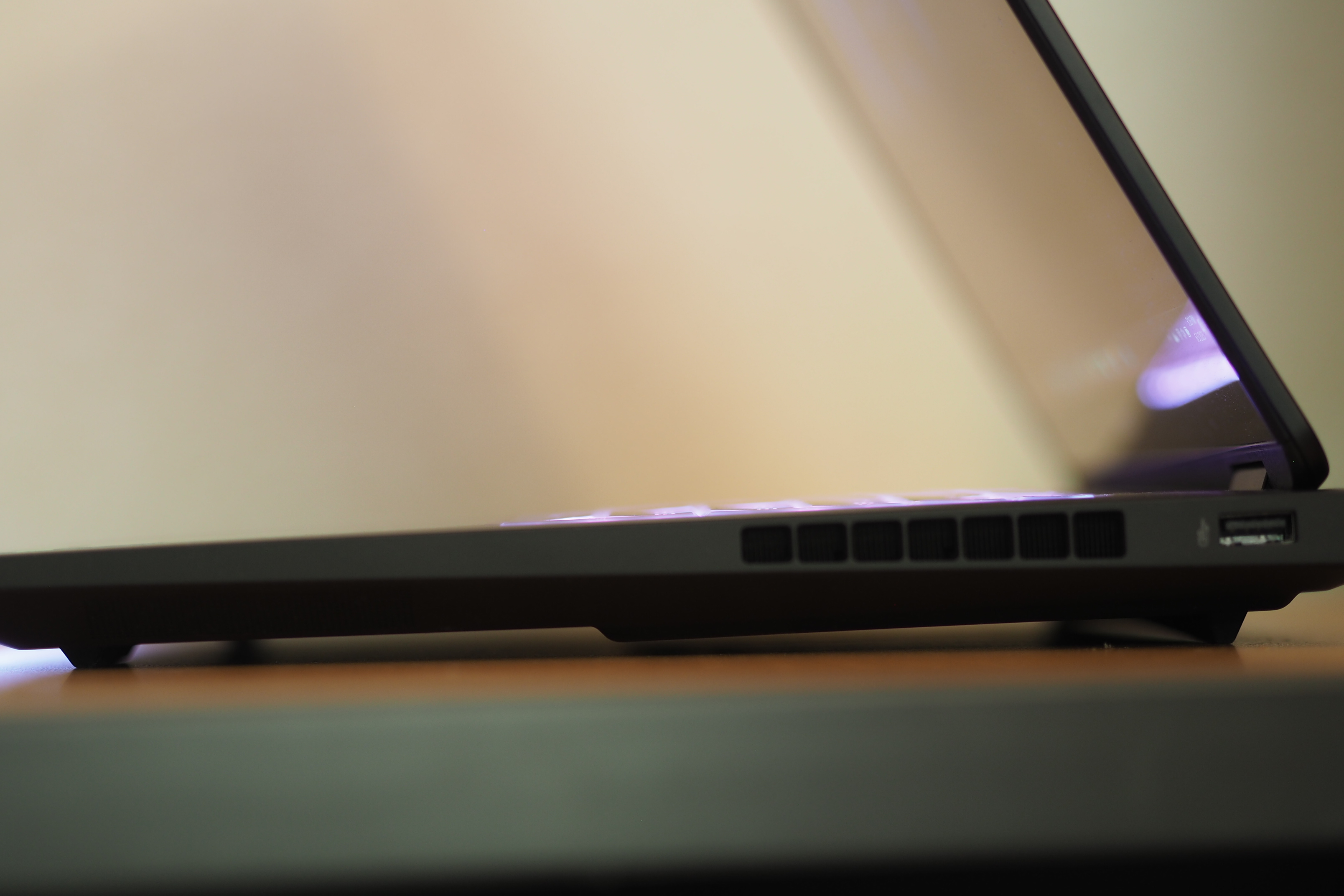 HP OMEN Max 16 side view showing lid and vents.